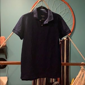 Navy blue woman’s polo shirt